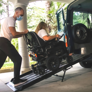 Person-in-wheelchair-on-ramp-to-go-in-a-van