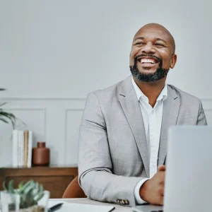 shot-of-a-mature-businessman-using-a-laptop